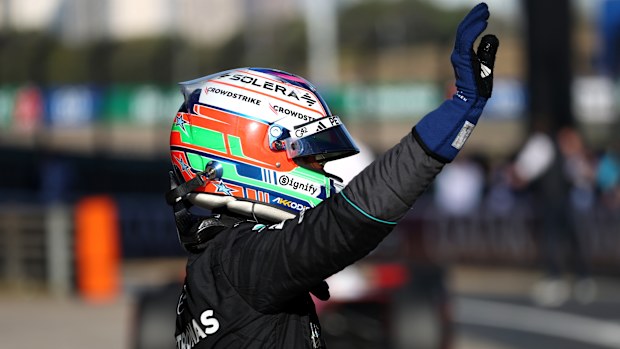 Pole position qualifier Andrea Kimi Antonelli of Italy and Mercedes AMG Petronas F1 Team waves to fans from parc ferme during qualifying ahead of the F1 Grand Prix of China at Shanghai International Circuit on March 14, 2026 in Shanghai, China. (Photo by Sam Bloxham/LAT Images)