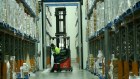 Cold storage trucks being loaded and unloaded at Americold Logistics in Laverton North. The company is a demand response client of EnerNOC, a US company.