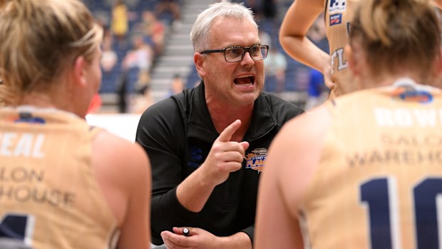 Sydney Flames head coach Shane Heal talks to players. (Photo by Morgan Hancock/Getty Images)