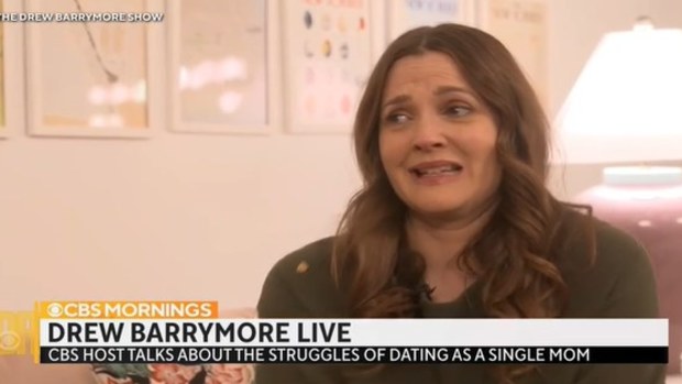 Drew Barrymore cries as she opens up about dating with kids. 