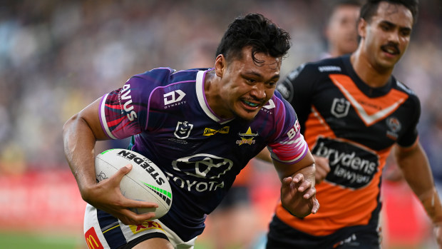 Jeremiah Nanai of the Cowboys scores a try during the round 19 NRL match between the North Queensland Cowboys and the Wests Tigers at Qld Country Bank Stadium, on July 24, 2022, in Townsville, Australia. (Photo by Ian Hitchcock/Getty Images)