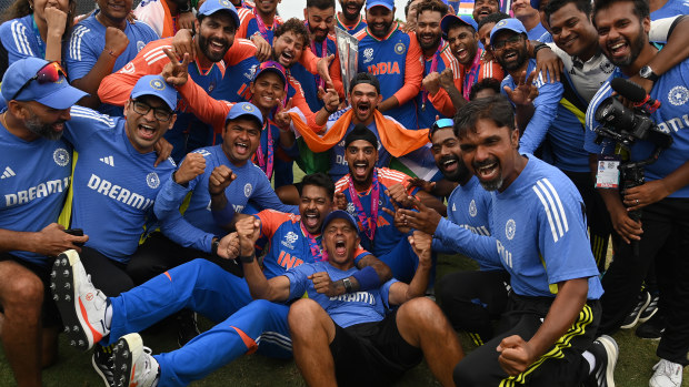 Rahul Dravid and the India team celebrate after India won the ICC Men's T20 Cricket World Cup West Indies & USA 2024 Final match between South Africa and India at Kensington Oval on June 29, 2024 in Bridgetown, Barbados. (Photo by Philip Brown/Getty Images)