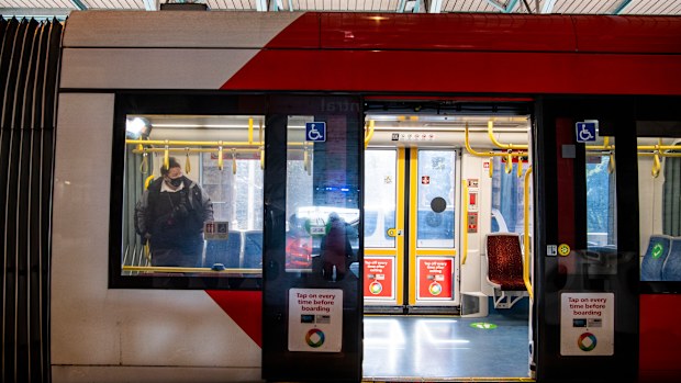 Commuters travelling on the Light rail.  Central Station. Sydney. Generic Public transport. Coronavirus COVID-19. 20th July 2021 Photo Louise Kennerley