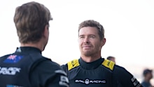 SYDNEY, AUSTRALIA - FEBRUARY 07: Tom Slingsby of Team Australia interacts with Peter Burling of Team New Zealand during a team photo media opportunity at Mrs Macquarie's Chair ahead of SailGP Sydney on February 07, 2025 in Sydney, Australia. (Photo by Wendell Teodoro/Getty Images)