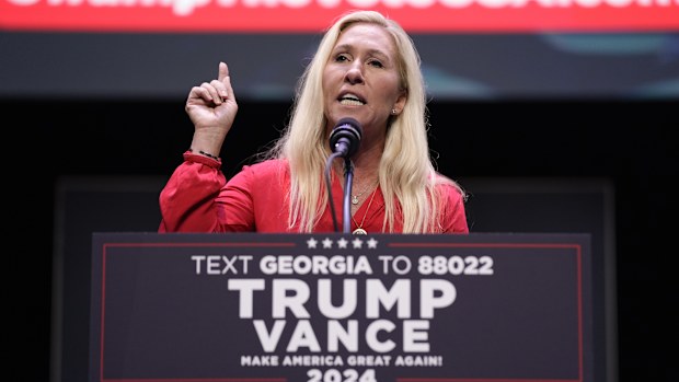 Rep. Marjorie Taylor Greene, R-Ga., speaks before Republican presidential candidate former President Donald Trump arrives to deliver remarks on the tax code, and manufacturing at the Johnny Mercer Theatre Civic Center, Tuesday, Sept. 24, 2024, in Savannah, Ga.