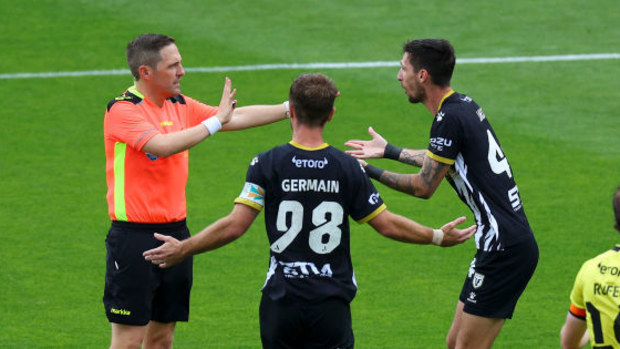Valère Germain and Marin Jakoli of Macarthur FC appeal to referee CK Kawana-Waugh for a direct penalty | A-League Men, Wellington Phoenix and Macarthur FC round 8