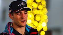 Jack Doohan answers questions in the media pen during the F1 Grand Prix of Bahrain.