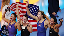 The United States' women's 4x100m medley relay team celebrates winning gold in the final event of the world championships.