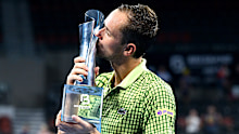 Daniil Medvedev of Russia poses with the trophy following his victory over American Brandon Nakashima in the men's singles final at the 2026 Brisbane International.