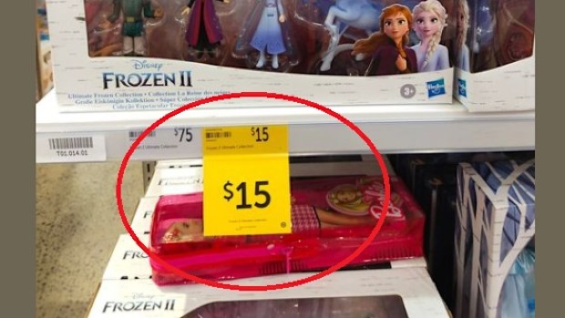The previous system saw large, paper sales tags being placed over the original price tags.
