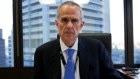ACCC chairman Rod Sims. Telstra claims ACCC decisions are a business risk.