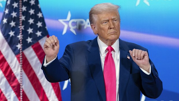 President Donald Trump dances after speaking at the Conservative Political Action Conference, CPAC, at the Gaylord National Resort & Convention Center, Saturday, Feb. 22, 2025, in Oxon Hill, Md. (AP Photo/Jose Luis Magana)