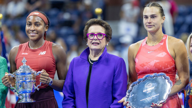 Coco Gauff and Aryna Sabalenka pose with their US Open trophies alongside tennis icon Billie Jean King.