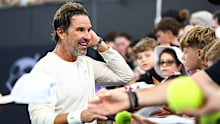 Patrick Rafter with fans after an exhibition match during day one of the 2025 Brisbane International at Pat Rafter Arena on December 29, 2024 in Brisbane, Australia. (Photo by Chris Hyde/Getty Images)