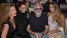 CROPPED: Flavio Briatore with guests during a business event in Dubai in 2016.