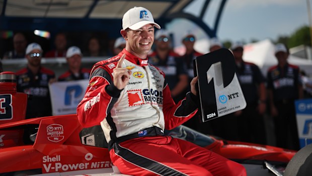 Scott McLaughlin celebrates pole position at Barber Motorsports Park.