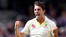 Pat Cummins of Australia celebrates after taking the wicket of Harry Brook of England.