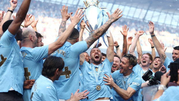 Mateo Kovacic of Manchester City celebrates with the Premier League Trophy after their team's victory during the Premier League match between Manchester City and West Ham United at Etihad Stadium on May 19, 2024 in Manchester, England. (Photo by Naomi Baker/Getty Images)