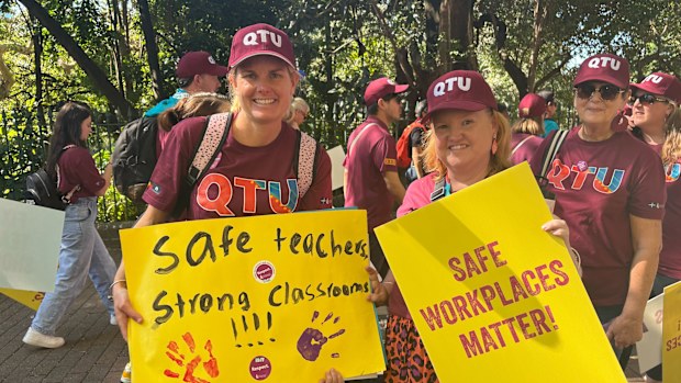 Two teachers in Queensland on a strike in August 2025.