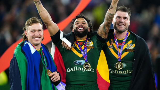 Australia's Reuben Cotter, Josh Addo-Carr and Angus Crichton celebrate following the Rugby League World Cup final at Old Trafford, Manchester. Picture date: Saturday November 19, 2022. (Photo by David Davies/PA Images via Getty Images)