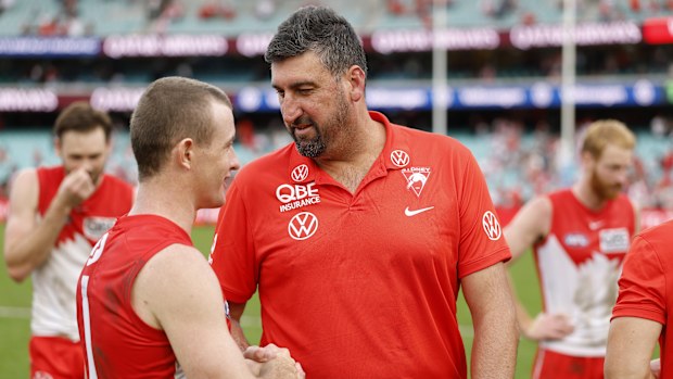 SYDNEY, AUSTRALIA - MAY 04: Chad Warner of the Swans speaks to Dean Cox, coach of the Sydney Swans after the round eight AFL match between Sydney Swans and GWS Giants at Sydney Cricket Ground, on May 04, 2025, in Sydney, Australia. (Photo by Darrian Traynor/AFL Photos/via Getty Images)