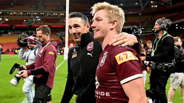 Billy Slater celebrates Queensland's series win with Origin rookie Tom Dearden after game three, 2022. 