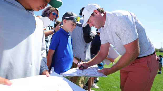 Grayson Murray of the United States signs autographs during a practice round prior to THE PLAYERS Championship on the Stadium Course at TPC Sawgrass on March 12, 2024 in Ponte Vedra Beach, Florida. (Photo by Kevin C. Cox/Getty Images)