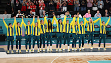 PARIS, FRANCE - AUGUST 11: Bronze medalist Team Australia pose for a photo on the podium during the Women's basketball medal ceremony on day sixteen of the Olympic Games Paris 2024 at Bercy Arena on August 11, 2024 in Paris, France. (Photo by Sarah Stier/Getty Images)