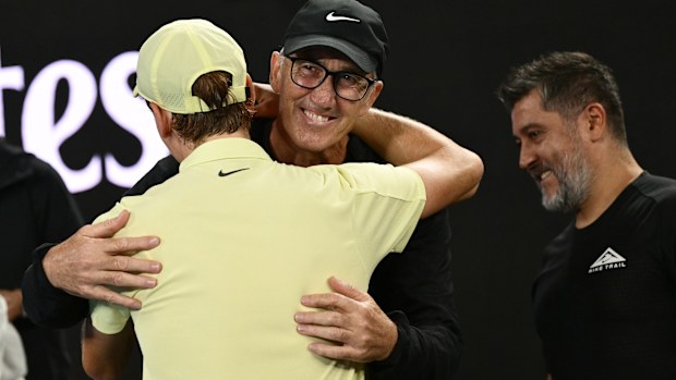 Jannik Sinner and Darren Cahill embrace after the Italian's 2025 Australian Open final triumph.