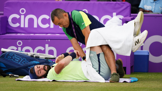 Jordan Thompson receives treatment during his match against Lorenzo Musetti (not pictured) on day eight of the cinch Championships at The Queen's Club, London. Picture date: Saturday June 22, 2024. (Photo by Zac Goodwin/PA Images via Getty Images)