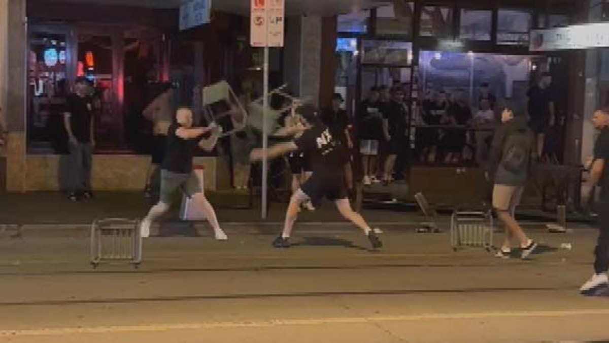 A-League football fans throw bar stools at Melbourne pub during violent ...