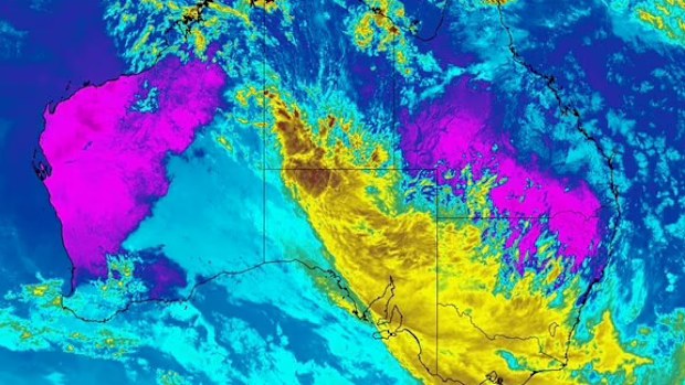 Large storm clouds loom over much of Australia.