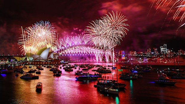 SYDNEY, AUSTRALIA - JANUARY 01: Fireworks light up the sky over the Sydney Harbour Bridge and the Sydney Opera House during New Year's Eve celebrations on January 01, 2024 in Sydney, Australia. Revellers turned out in large numbers to celebrate the new year in Australia. (Photo by Roni Bintang/Getty Images) *** BESTPIX ***