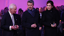 OSWIECIM, POLAND - JANUARY 27: (L-R) King Charles III and King Frederik X of Denmark and Queen Mary of Denmark wait to place a lit candle as tribute is paid to the Holocaust victims during the ceremony for the 80th anniversary of the liberation of the Auschwitz camp on January 27, 2025 in Oswiecim, Poland. The Nazis built and operated the Auschwitz complex of concentration camps during World War II initially for slave labor and later for the mass extermination of Jews and other undesirables. App