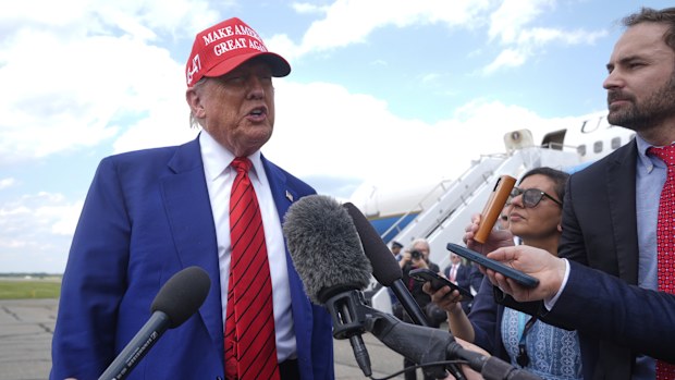 President Donald Trump speaks with reporters upon arriving at Morristown Municipal Airport in Morristown, N.J., Friday, June 20, 2025. (AP Photo/Manuel Balce Ceneta)