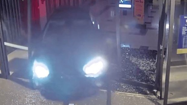 Police allege the man smashed his way through the glass doors of Gladstone Centre Plaza.