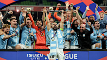 MELBOURNE, AUSTRALIA - MAY 31: Aziz Behich of the City holds aloft the Championship Trophy after winning the A-League Men Grand Final match between Melbourne City and Melbourne Victory at AAMI Park on May 31, 2025, in Melbourne, Australia. (Photo by Robert Cianflone/Getty Images)