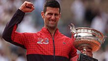 Novak Djokovic of Serbia celebrates beating Casper Ruud in the Roland-Garros final.