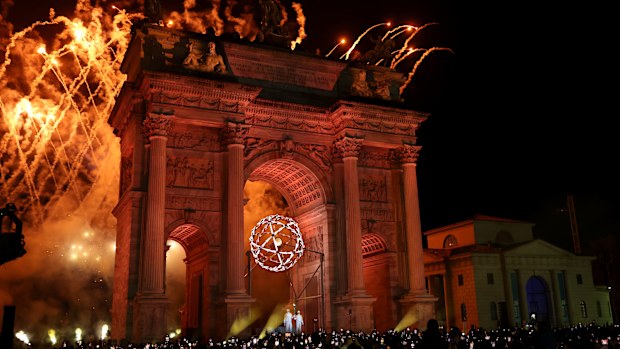 The lighting of the Olympic cauldron at the Arco della Pace in Milan.