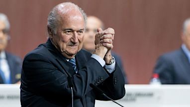 Blatter celebrates re-election...