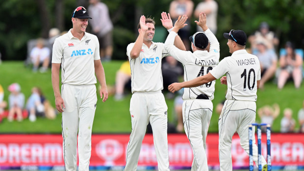 Tim Southee is congratulated by his team mates after dismissing Glenton Stuurman of South Africa.