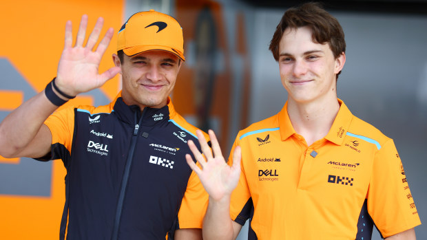 Lando Norris of Great Britain and McLaren and Oscar Piastri of Australia and McLaren look on in the pitlane during previews ahead of the F1 Grand Prix of Japan at Suzuka International Racing Course on April 04, 2024 in Suzuka, Japan. (Photo by Clive Rose - Formula 1/Formula 1 via Getty Images)