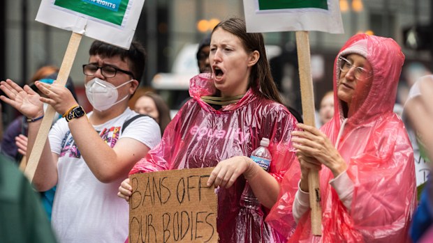 People attend a rally in response to the U.S. Supreme Court decision to reverse Roe v. Wade, at Federal Plaza in the Loop, in Chicago.