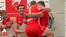 Chad Warner leaps into Dean Cox's arms.