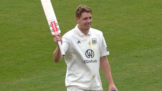 Cameron Green raises the bat.