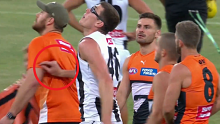 Mason Cox shoved Giants ruck coach Shane Mumford in strange pre match scenes.