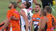 Mason Cox shoved Giants ruck coach Shane Mumford in strange pre match scenes.