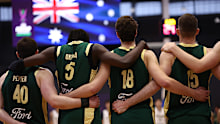 GIPPSLAND, AUSTRALIA - FEBRUARY 23: Australia embrace during the national anthem prior to the FIBA Asia Cup Qualifier match between Australia Boomers and Thailand at Gippsland Regional Indoor Sports Stadium on February 23, 2025 in Gippsland, Australia. (Photo by Graham Denholm/Getty Images)