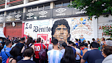 BUENOS AIRES, ARGENTINA - NOVEMBER 25: Fans mourn Diego Maradona at Argentinos Juniors' Diego Maradona Stadium on November 25, 2020 in Buenos Aires, Argentina. Diego Maradona, considered one of the biggest football stars in history, died at 60 from a heart attack on Wednesday in Buenos Aires. (Photo by Fernando de Dios/Getty Images