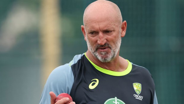 Sam Konstas of Australia speaks with batting coach Michael Di Venuto.